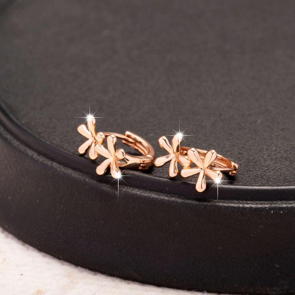 Rose gold circular earrings with waterdrop flower design for women