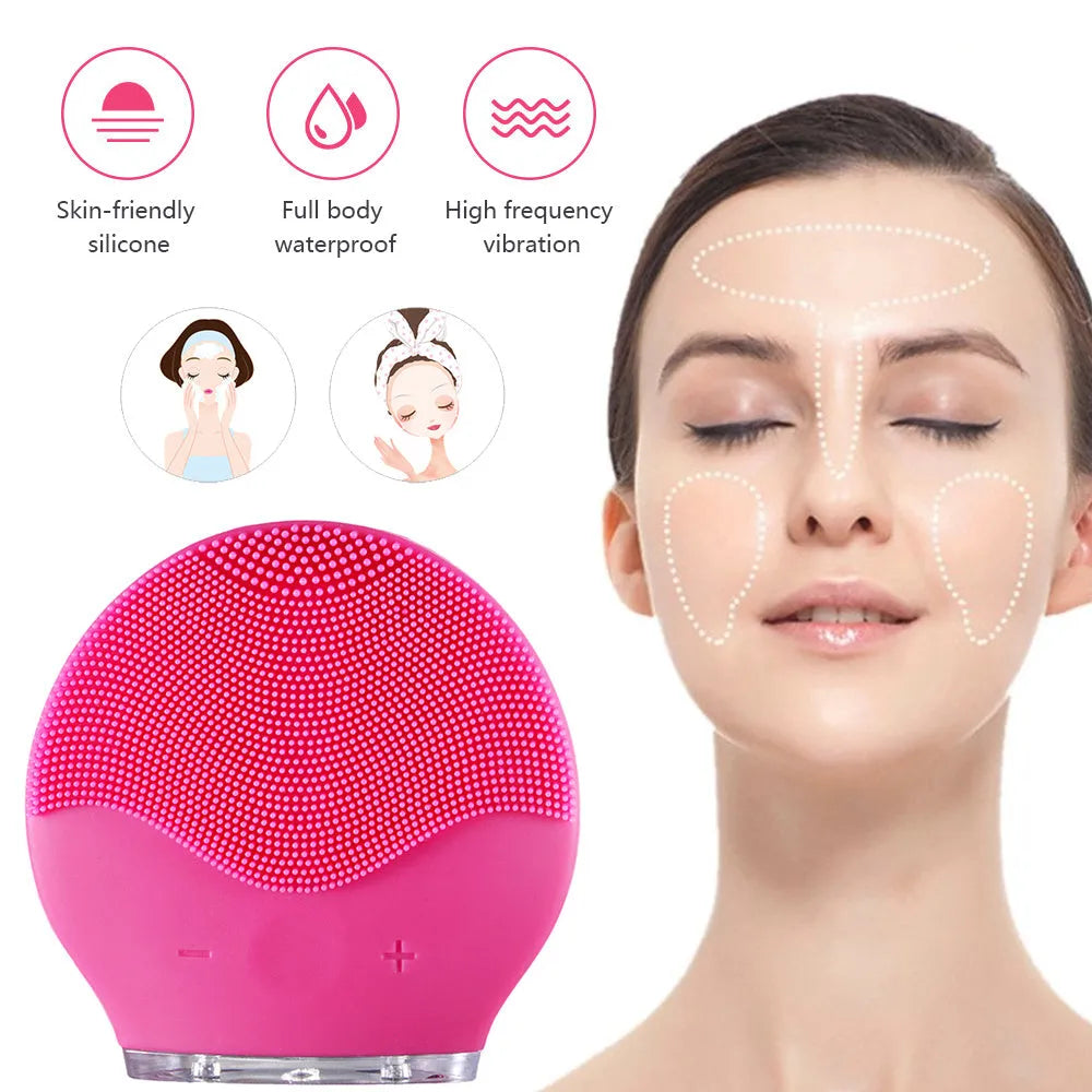 Electric waterproof silicone mini facial cleansing brush in pink with USB charging cable