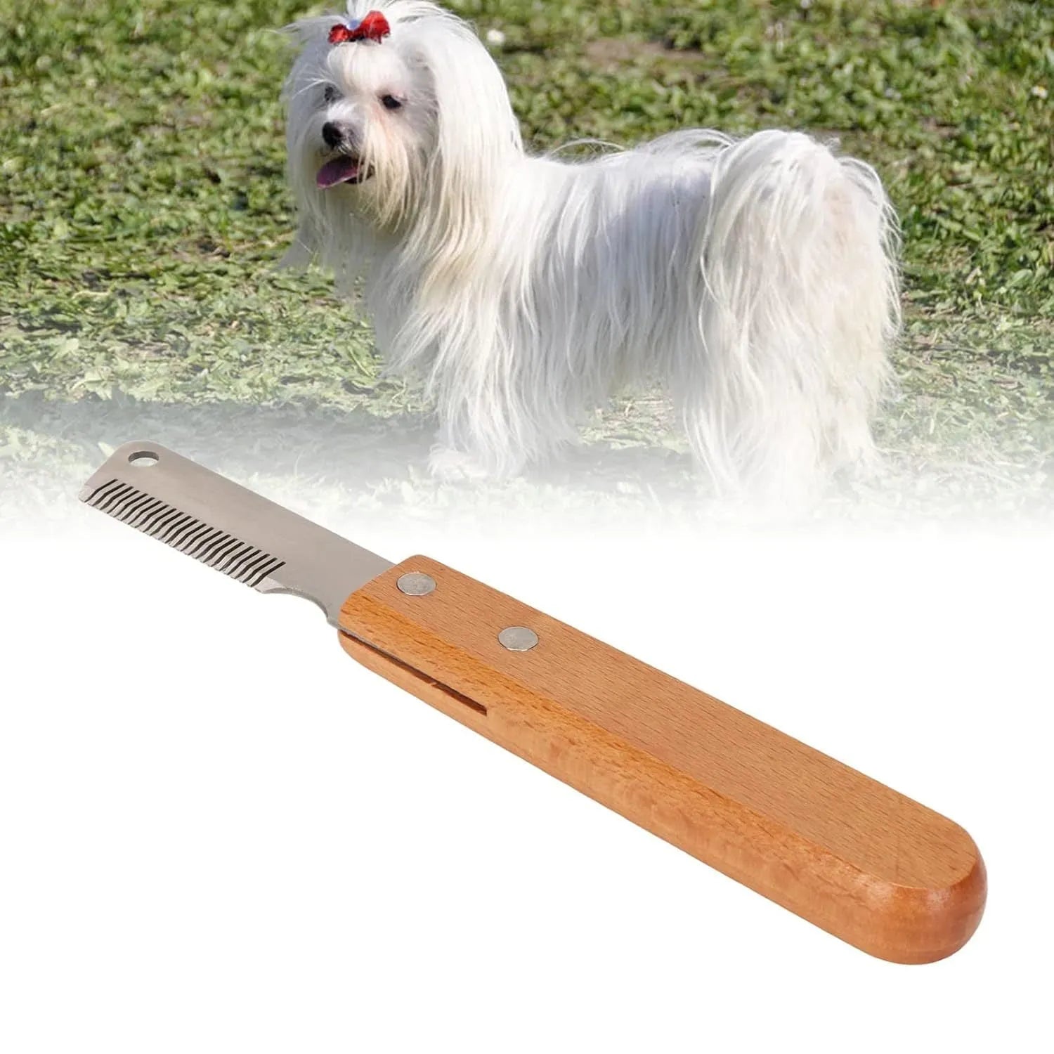 Wooden handled pet stripping comb grooming tool for dogs and cats on a table.