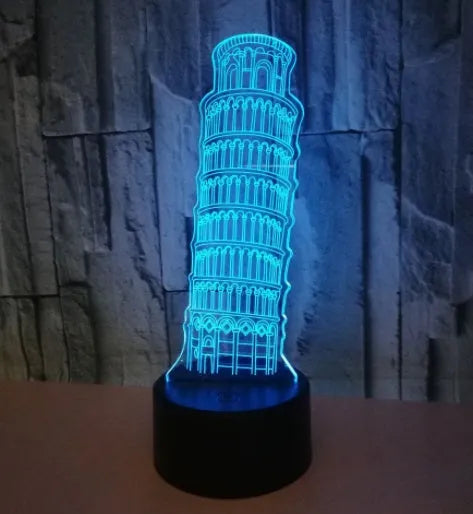 3D Leaning Tower of Pisa acrylic night light on black ABS base, displaying blue LED illumination.