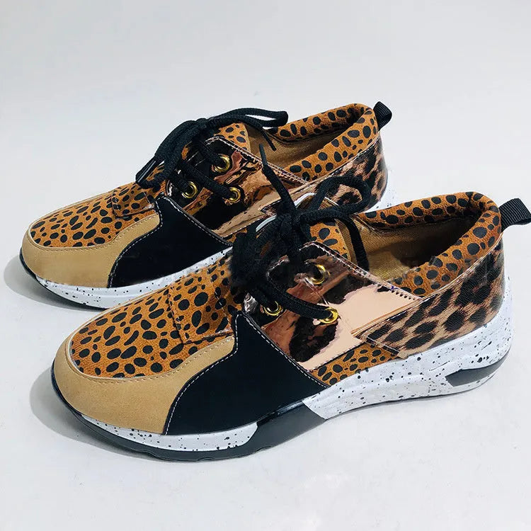 Women's casual suede sneakers with wedge heel in leopard print and black colour options