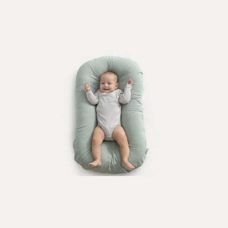 Beige portable cotton baby nest crib for newborns measuring 75cm by 45cm