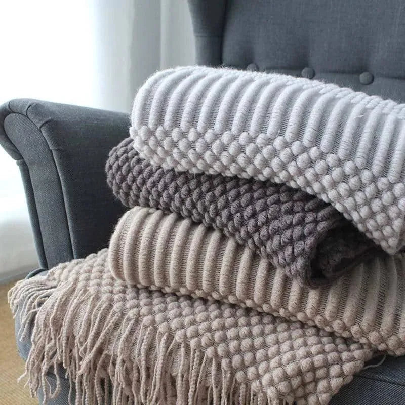 Small 127cm by 170cm polyester nap blanket shown in dark grey, khaki, and light grey colour options.