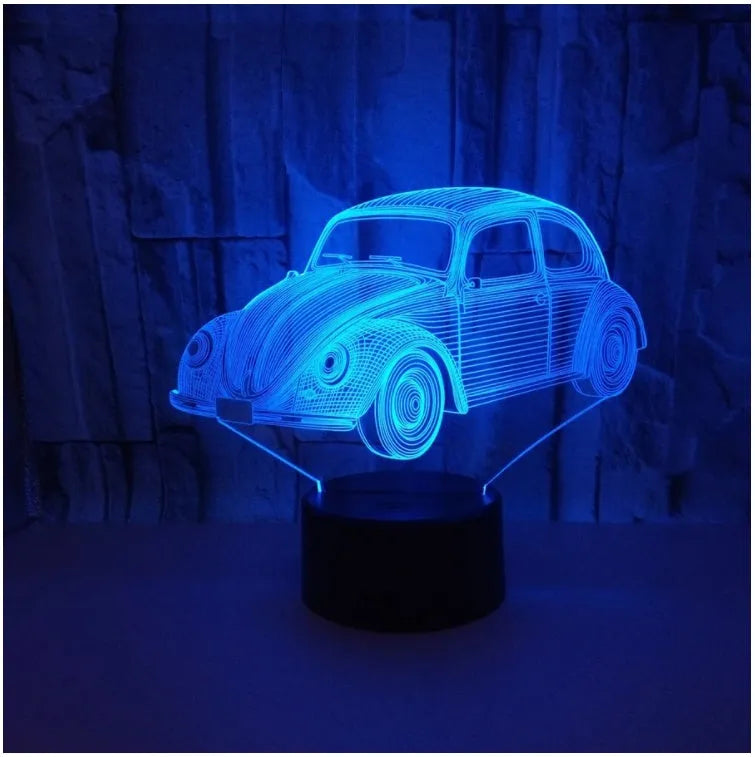 Black LED table lamp with colourful acrylic shade and remote control on wooden desk