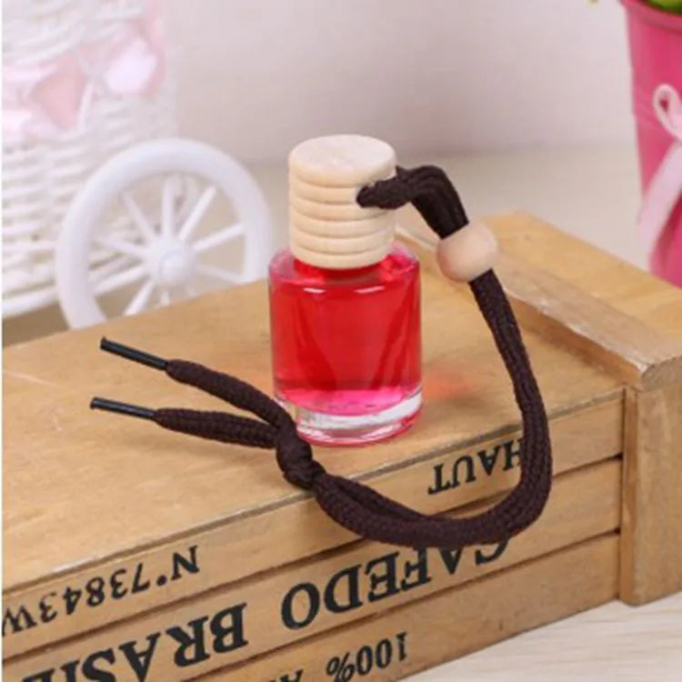 Car air freshener glass bottle hanging ornament with 55g net content, available in six scents including lavender and lemon