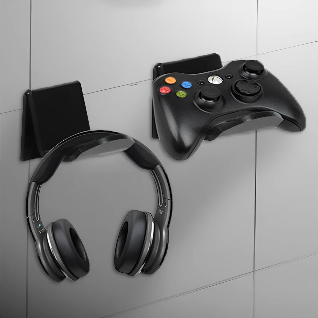 Universal plastic game controller bracket mounted on a wall in a choice of black, white, or transparent.