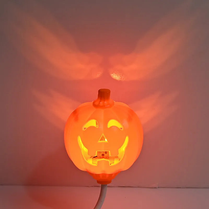 USB-powered plastic pumpkin decorative lamp showing yellow or purple light option