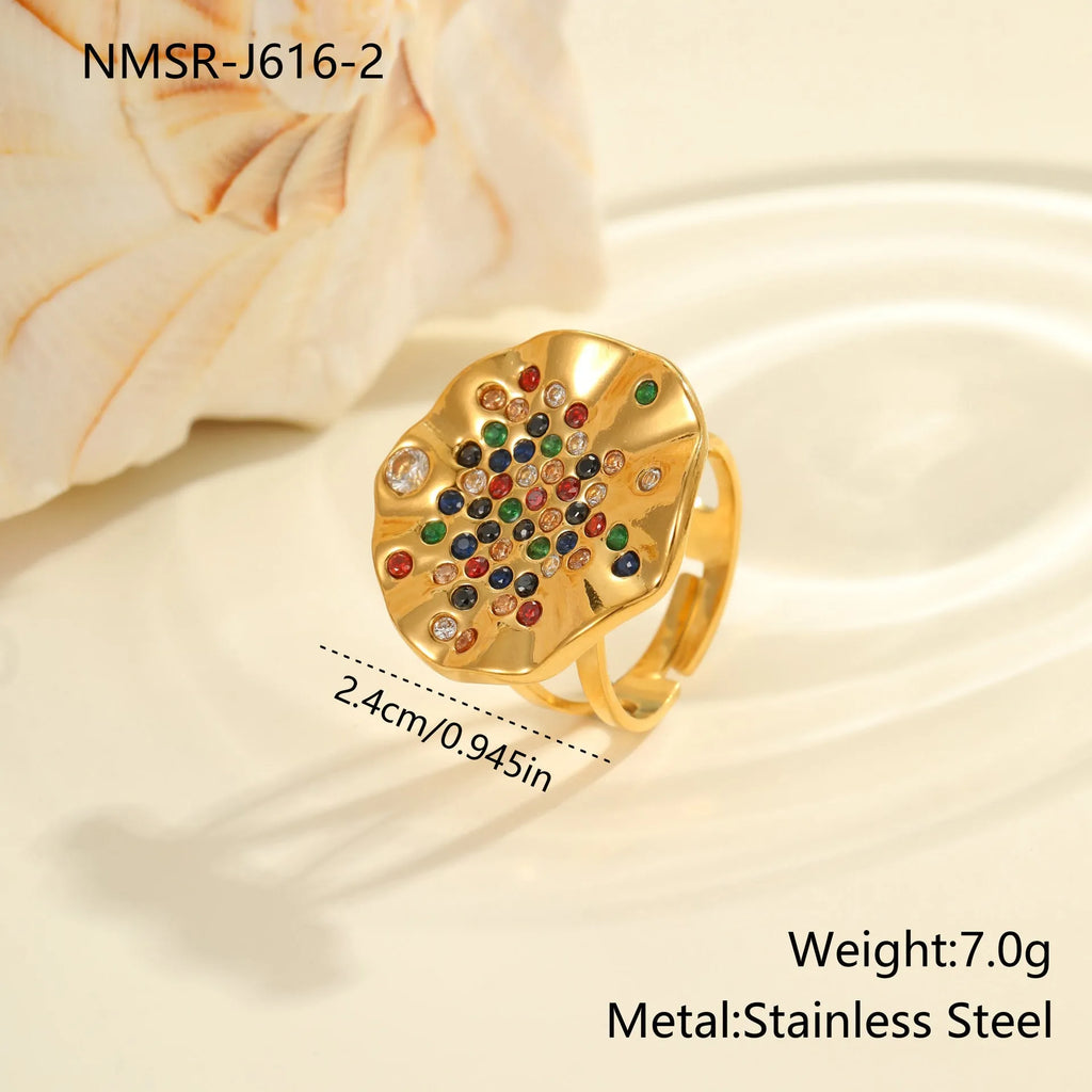 Geometric open mouth ring with pleated detailing and colourful crystal inlay on stainless steel