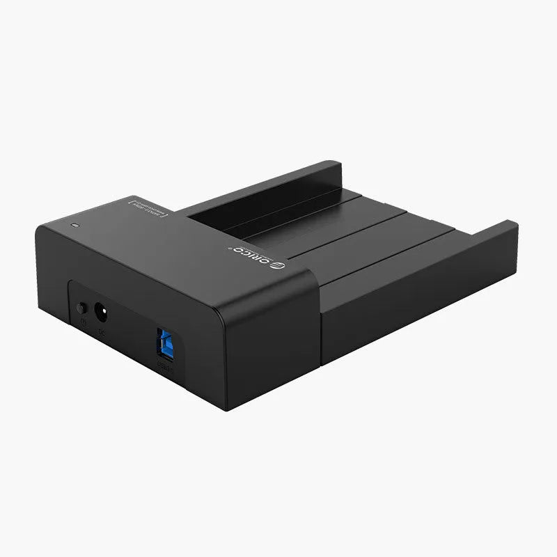 Black plastic universal hard disk enclosure for 2.5-inch and 3.5-inch SATA drives with data cable.