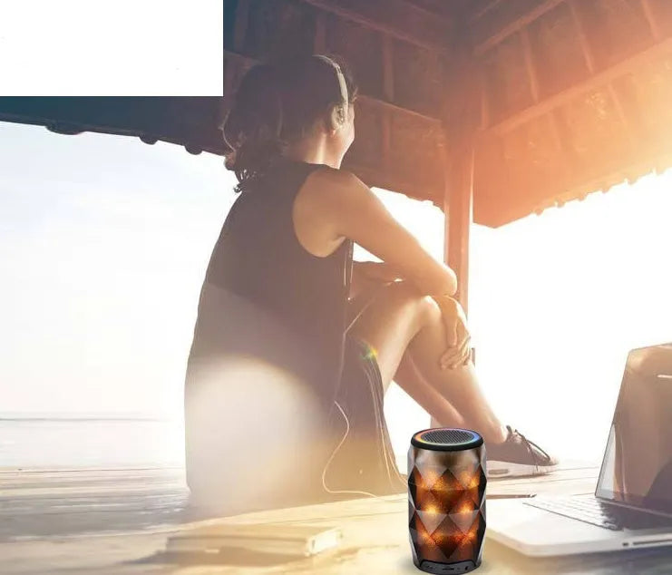 Black crystal diamond cut Coca-Cola can shaped lantern with Bluetooth speaker and colourful LED lights.