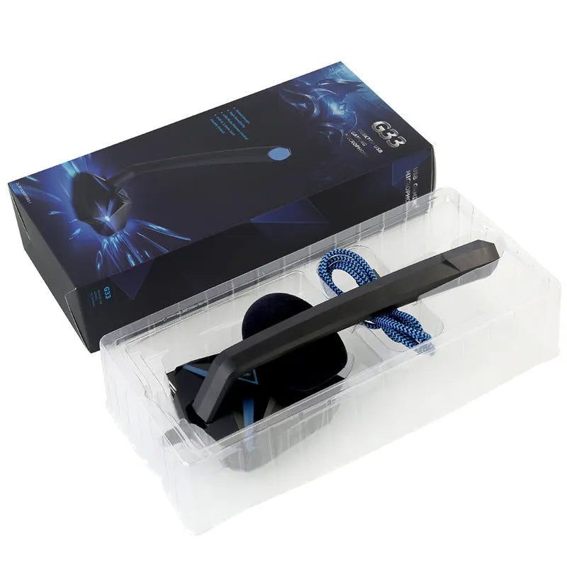 G33 USB gaming microphone in blue with omnidirectional capsule and mute button on desk