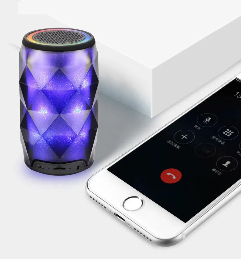 Black crystal diamond cut Coca-Cola can shaped lantern with Bluetooth speaker and colourful LED lights.