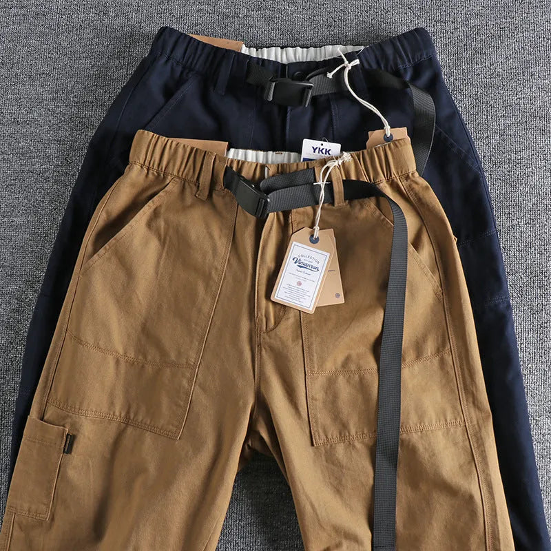 Men's cotton work trousers with NI buckle belt in khaki colour showing three-dimensional cutting detail