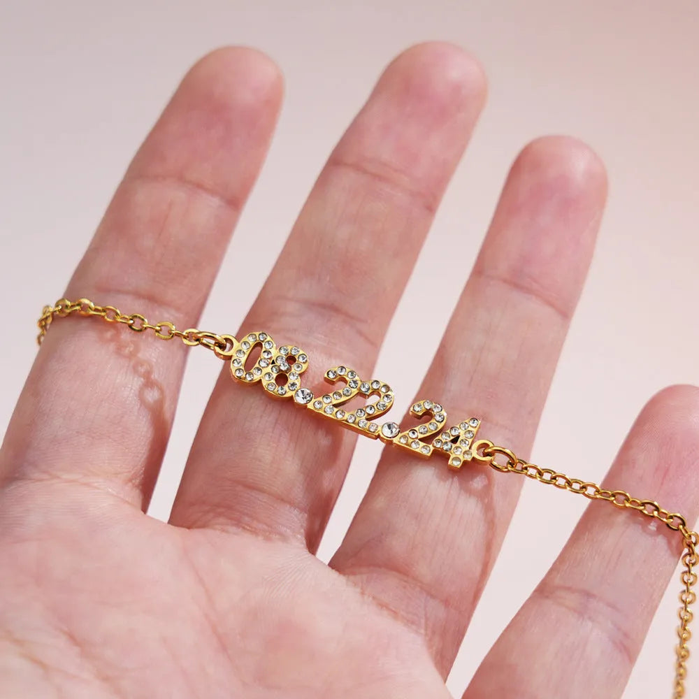 Stainless steel digital bracelet with diamond studded numbers in gold, rose gold or steel colour