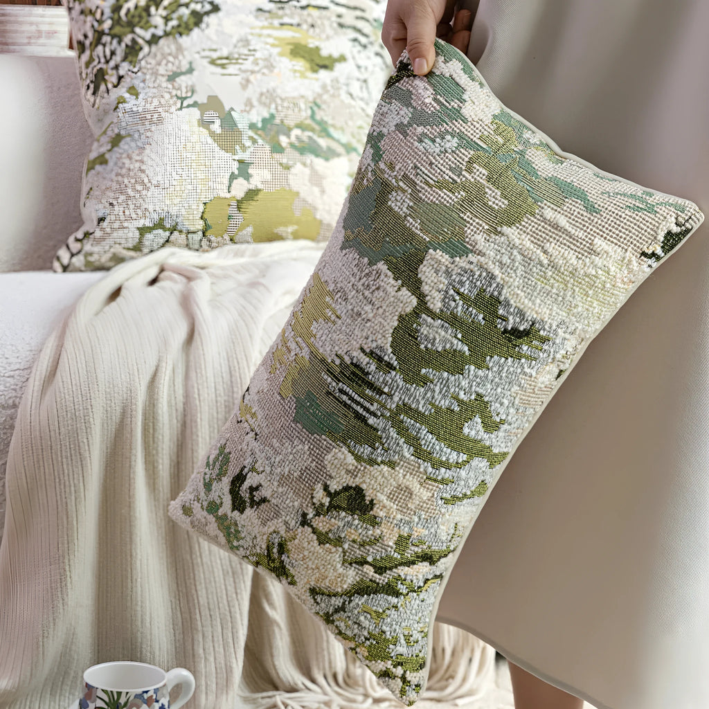 Green wool blend cushion with abstract French antique spring flower pattern, shown in square and rectangular sizes.
