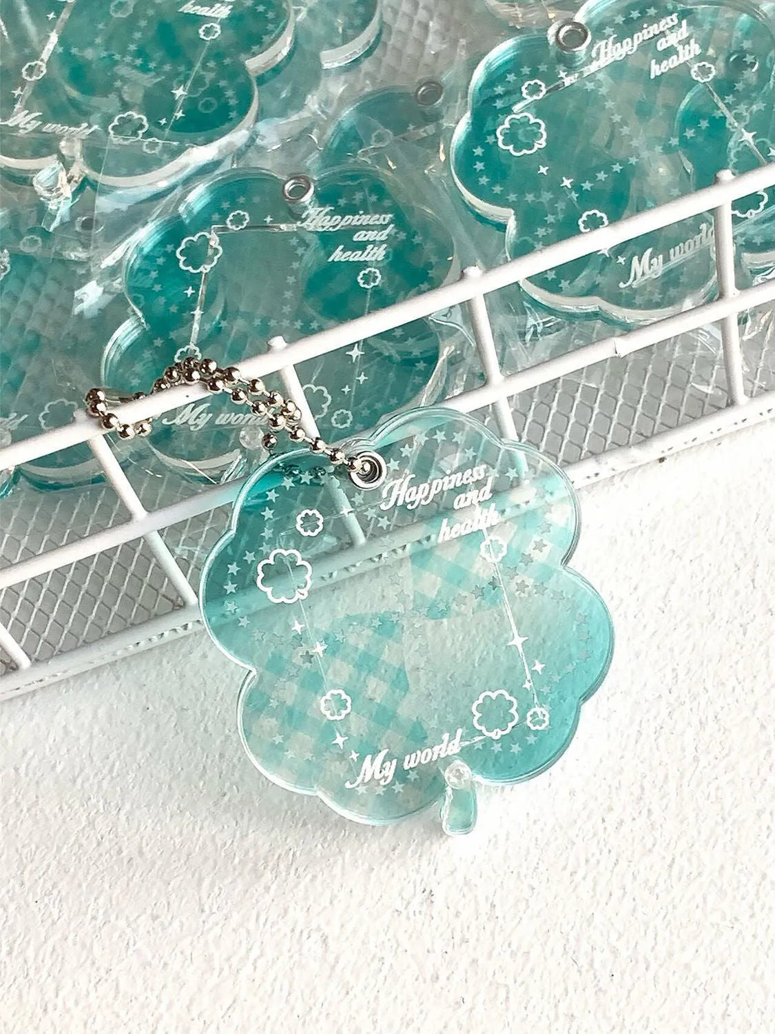 Acrylic four-leaf clover phone pendant keychain in blue, green, or mint