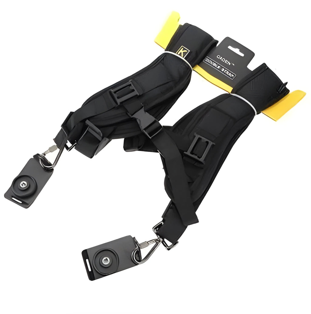 Black professional dual camera shoulder strap for SLR cameras shown on a person, highlighting thick shoulder sponge and metal connectors.