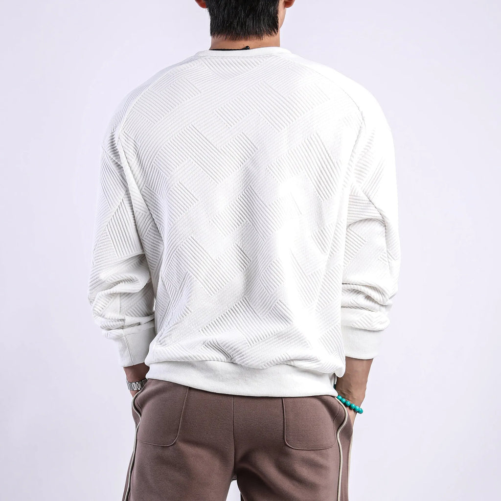 Men's loose fit long sleeve twill Jacquard sweater in solid colours on a hanger.
