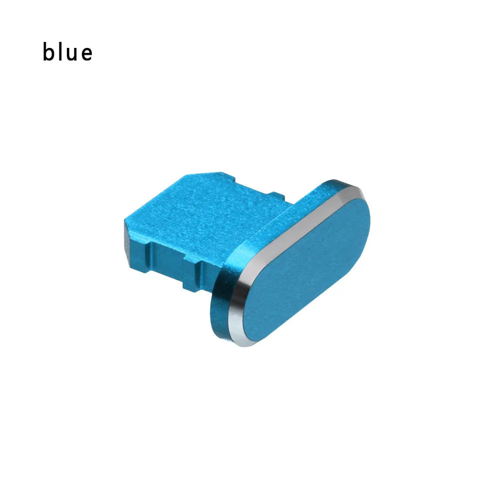 Aluminium alloy iPhone charging port dust plug in metallic colours on a dark background.