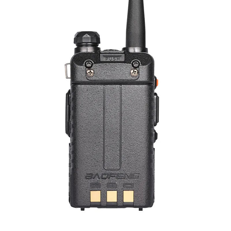 Professional handheld VHF UHF two-way radio walkie talkie with extended antenna.