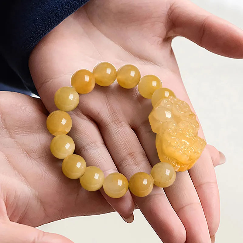 Golden Thread Jade money bracelet carved from Jinsi Jade showing large and small size options