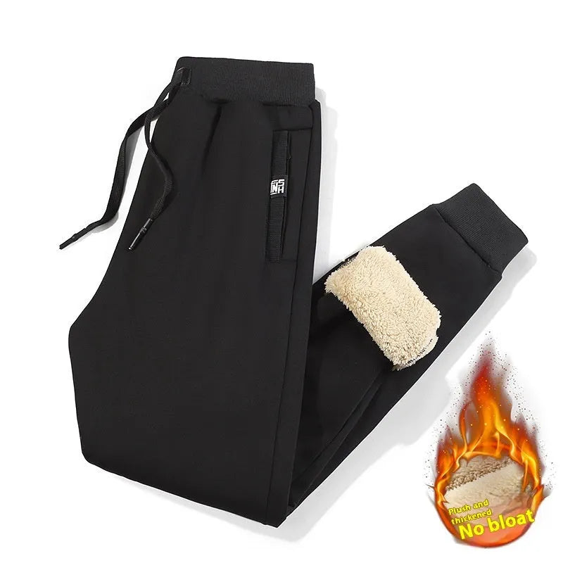 Men's grey fleece-lined cotton track pants with elastic waist and straight leg style