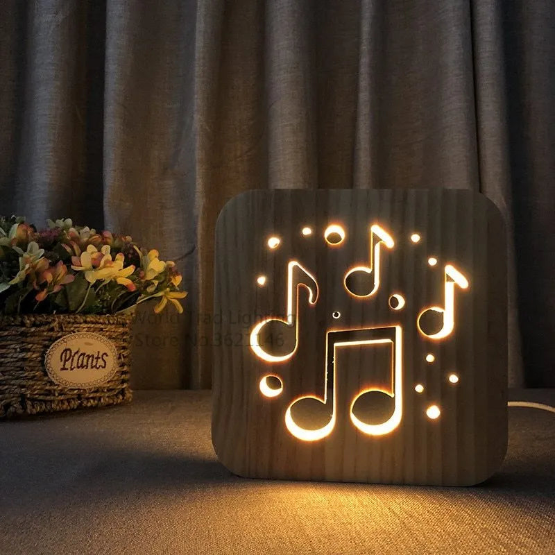 Square pine wood USB LED atmosphere lamp emitting warm white light on a desk.