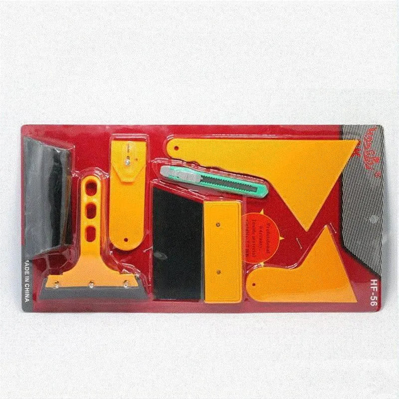 Seven-piece car foil tool set showing scrapers, knives, and a pressing block for film installation.