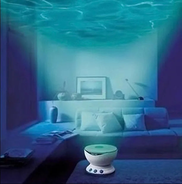 Blue ocean theme LED projection lamp with DLP correction on a surface.