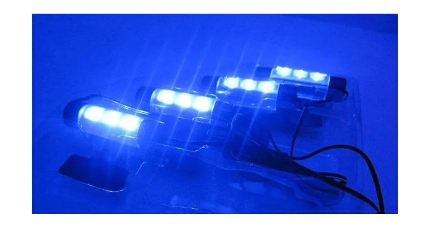 Compact blue LED car interior footwell light with 60mm length and 16mm diameter, rotating head and cable