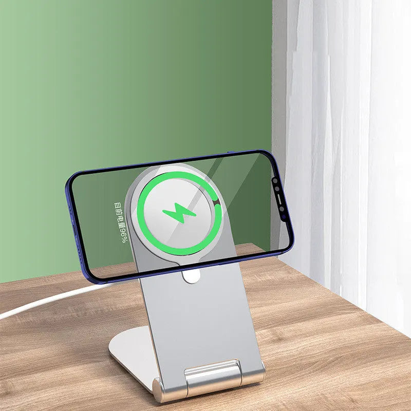 Silver portable magnetic bracket for iPhone 12 showing vertical angle adjustment mechanism