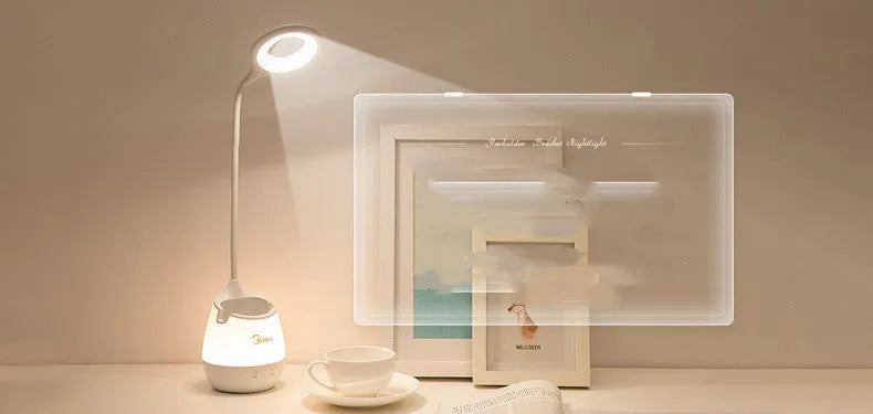 Green USB rechargeable LED desk lamp with touch control switch on a wooden table.