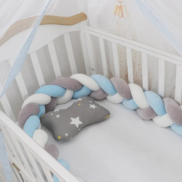 Braided knot baby crib bumper pillow in spandex velvet showing bendable design and colour options.