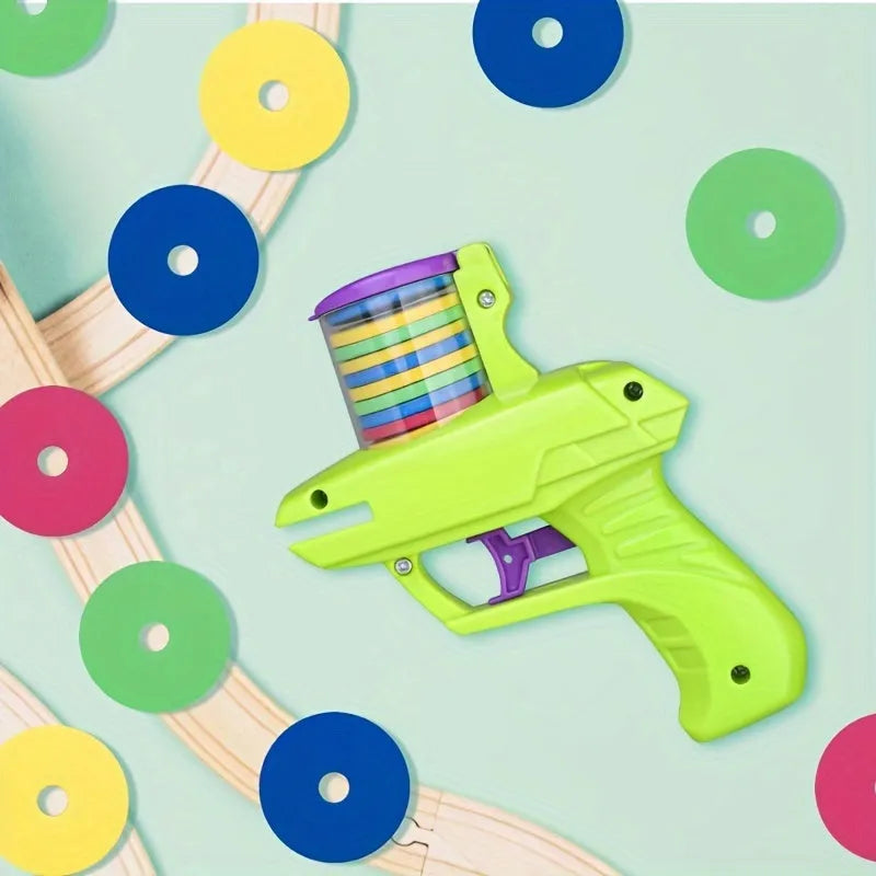 Battery-free interactive cat toy launcher firing foam disc with green and purple colour options