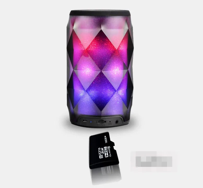 Black crystal diamond cut Coca-Cola can shaped lantern with Bluetooth speaker and colourful LED lights.