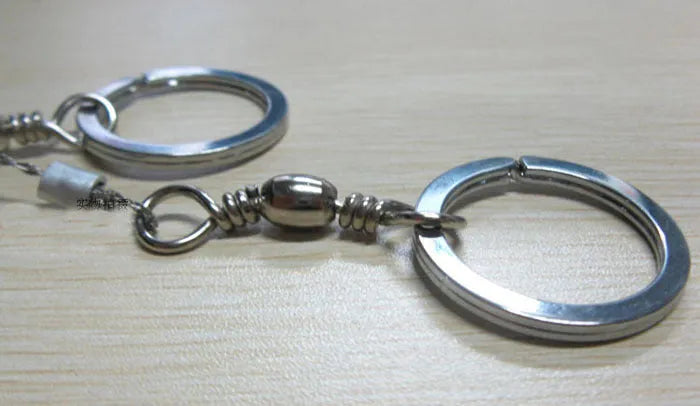 55cm survival wire saw with stainless steel blade and thumb rings for outdoor cutting