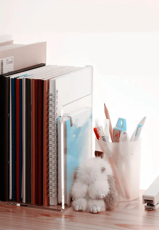 Transparent acrylic bookshelf for students holding a small number of books on a desk