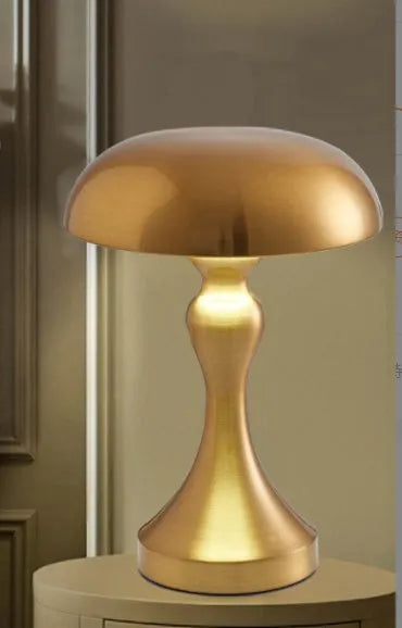 Bronze metal USB rechargeable desk lamp with touch control and three colour light settings.