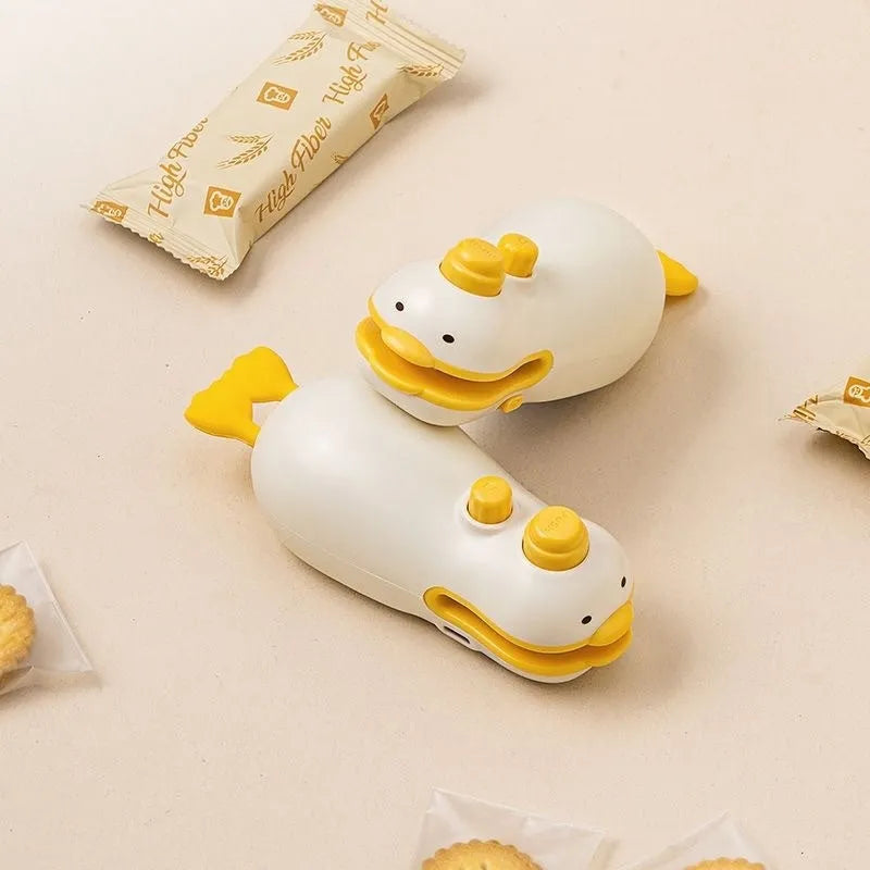Yellow duck animal jacquard rechargeable sealing machine with USB charging cable