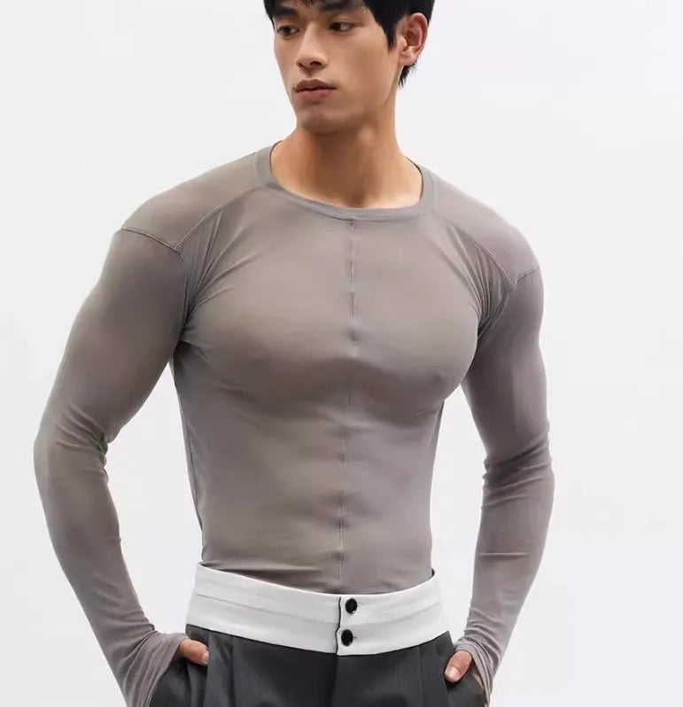 Black slim-fit long sleeve PU mesh pullover top with a see-through texture on a model.