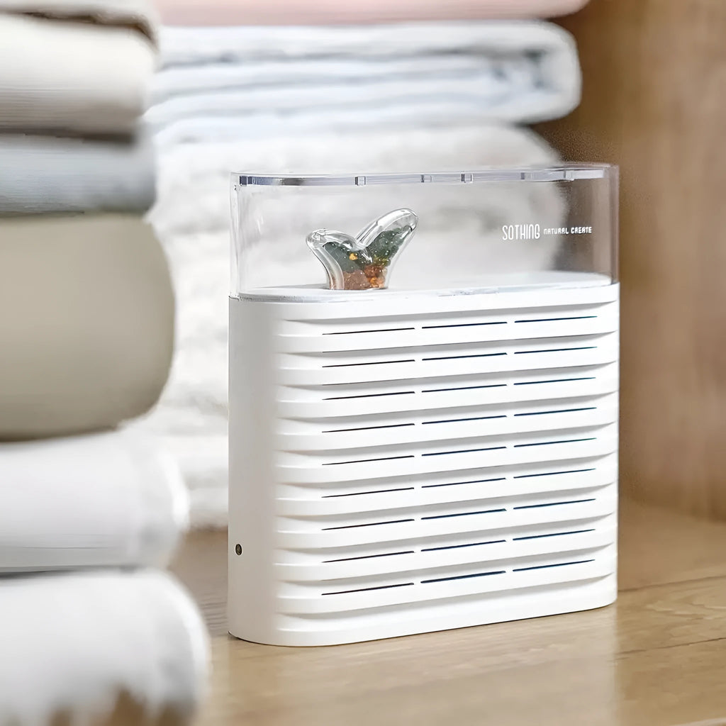 White recyclable cabinet dehumidifier with transparent cover showing colour-changing beads