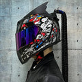 Pair of matching full face motorcycle helmets with colourful graphic designs like Blue Diamond.