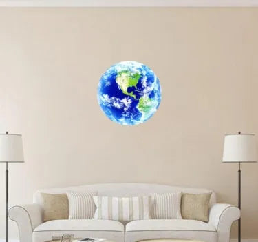 Glow in the dark 3D planet Earth wall sticker in 30cm diameter on a dark blue wall.