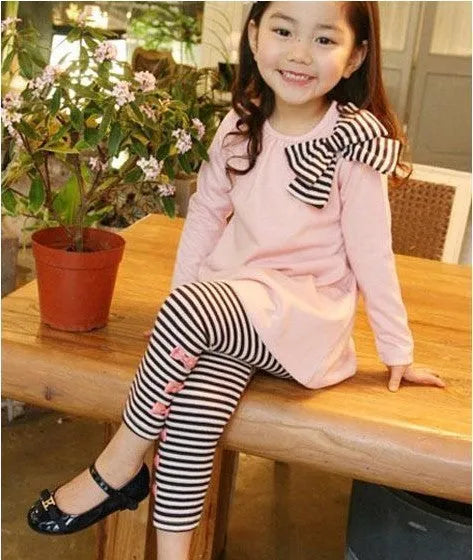 Pink 100% cotton girls clothing set available in sizes 110cm, 120cm, 130cm, and 140cm.
