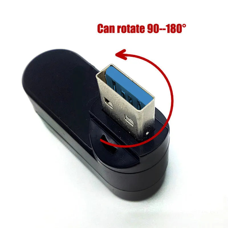 Black and white USB rotary splitter hub with four ports on a rotating body.