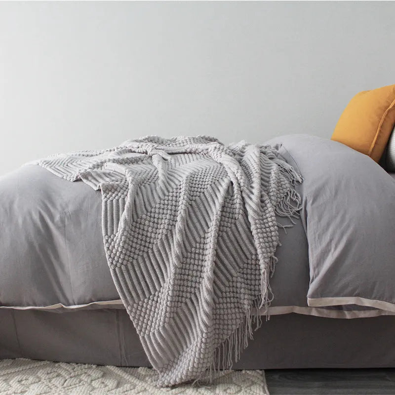 Small 127cm by 170cm polyester nap blanket shown in dark grey, khaki, and light grey colour options.