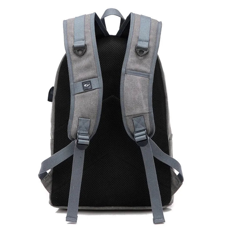 Canvas backpack with USB charging port showing coffee colour variant