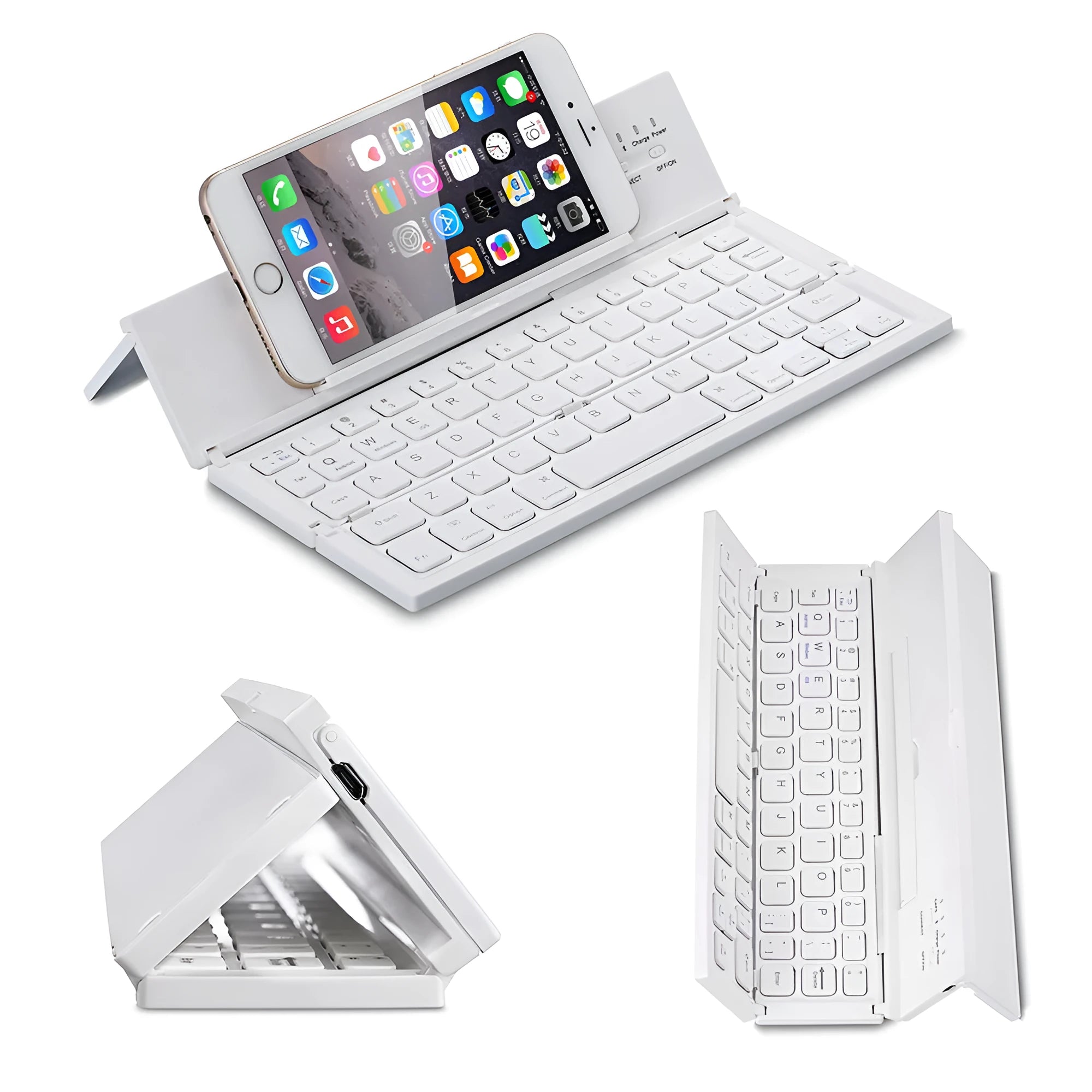 Black folding wireless Bluetooth keyboard shown open next to a tablet demonstrating its compact portable size.