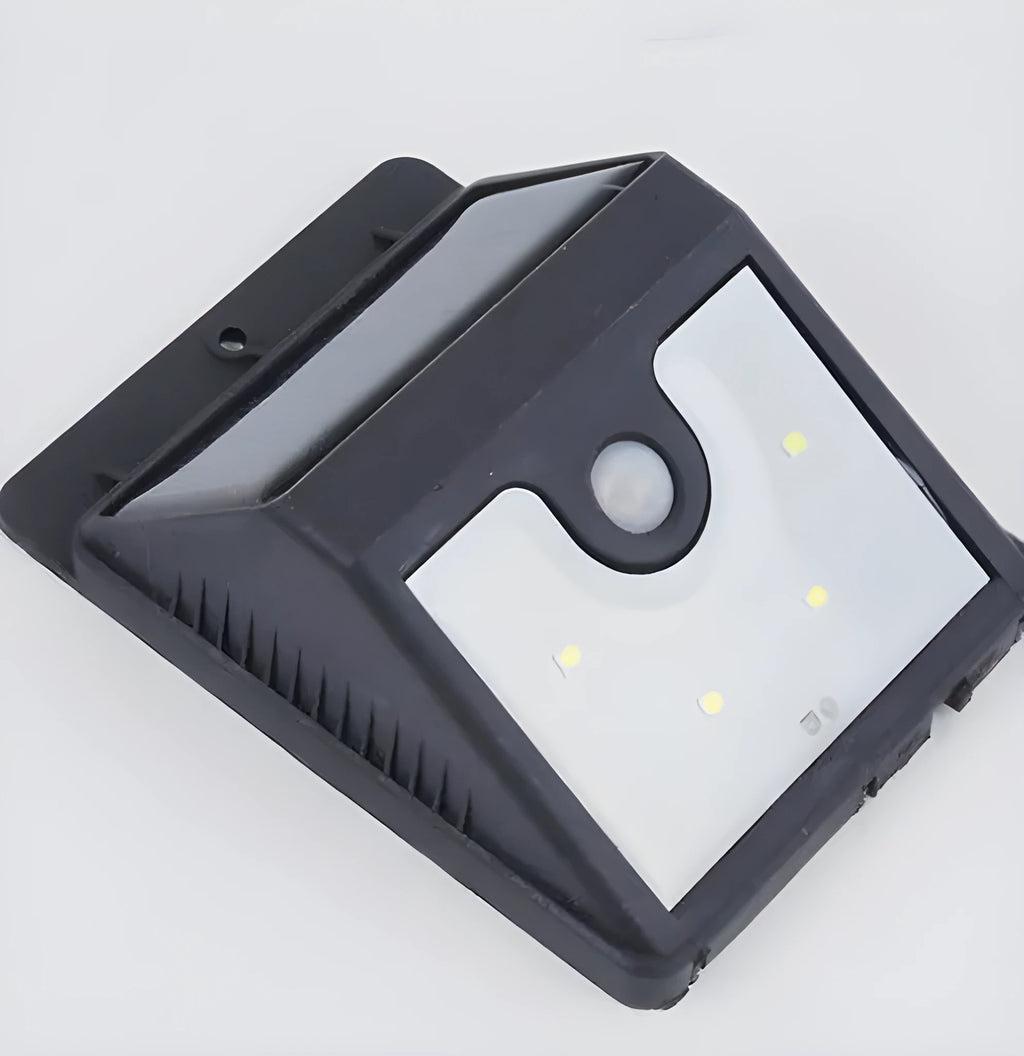 White solar-powered outdoor wall light with four LEDs and adjustable solar panel for motion-activated garden security