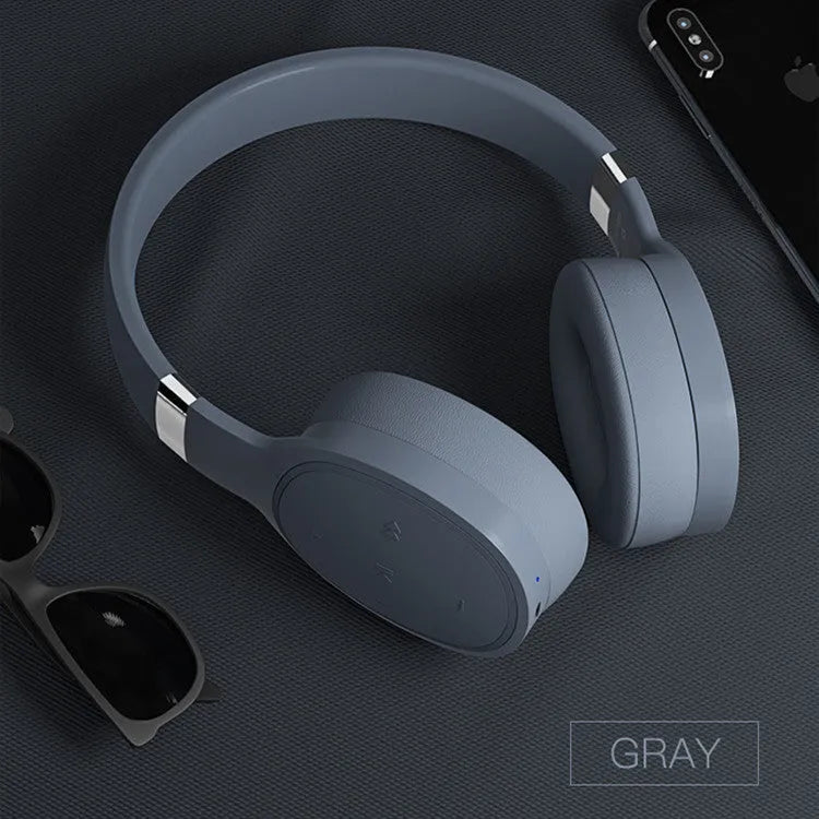 Wireless Bluetooth headset in black, blue, grey, or white with over-ear 40mm speakers.